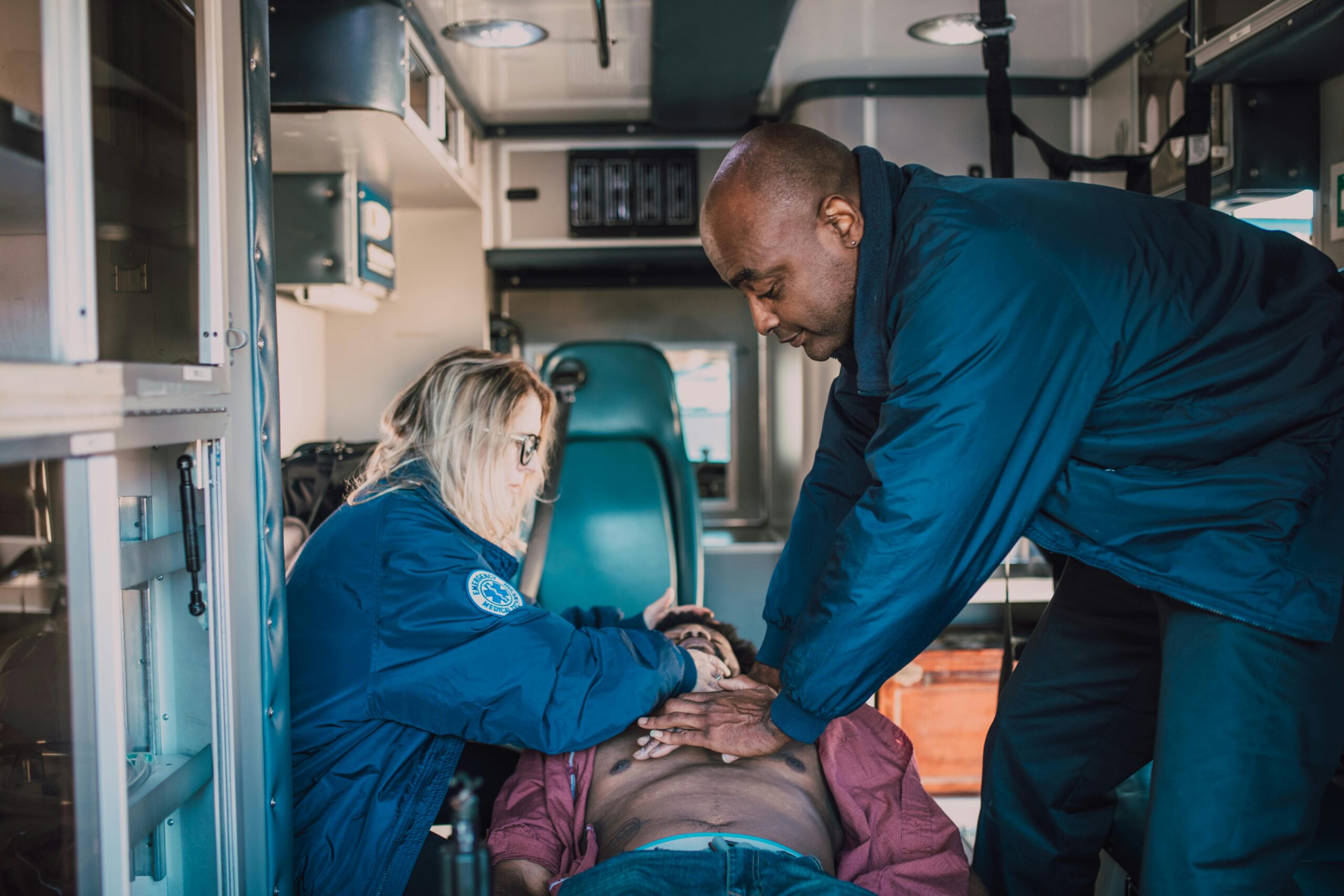 Two EMTs performing CPR