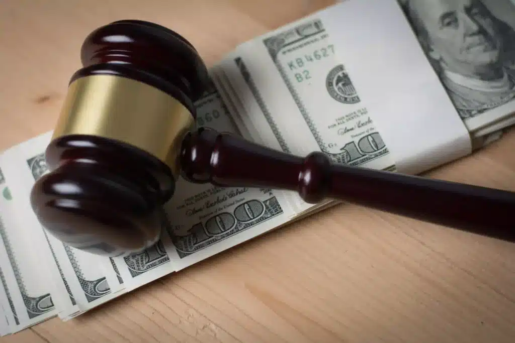 concept-of-legal-court-gavel-on-assorted-cash-clo-