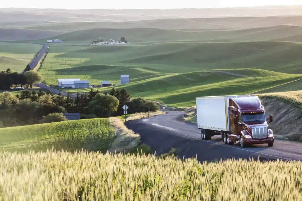 commercial-truck-driving-though-wheat-fields-of-ea