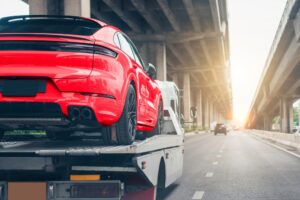 A car on the back of a tow truck. Can I sue after a tow truck accident in New Orleans?