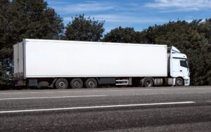 A semi-truck on the highway. What do I look for when choosing a semi-truck accident lawyer in New Orleans?