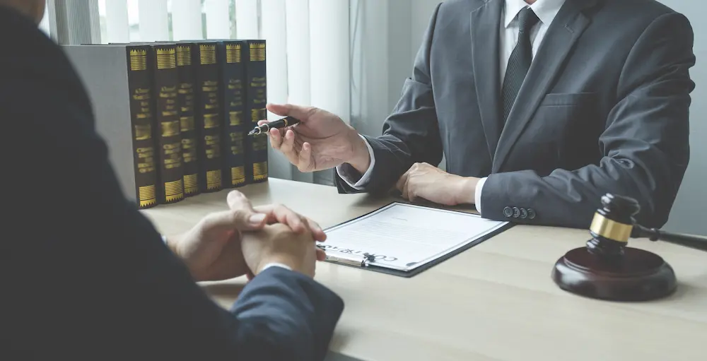 A lawyer having a legal consultation with a client
