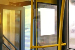 The doors of a city bus. What happens if a city bus hits my car?