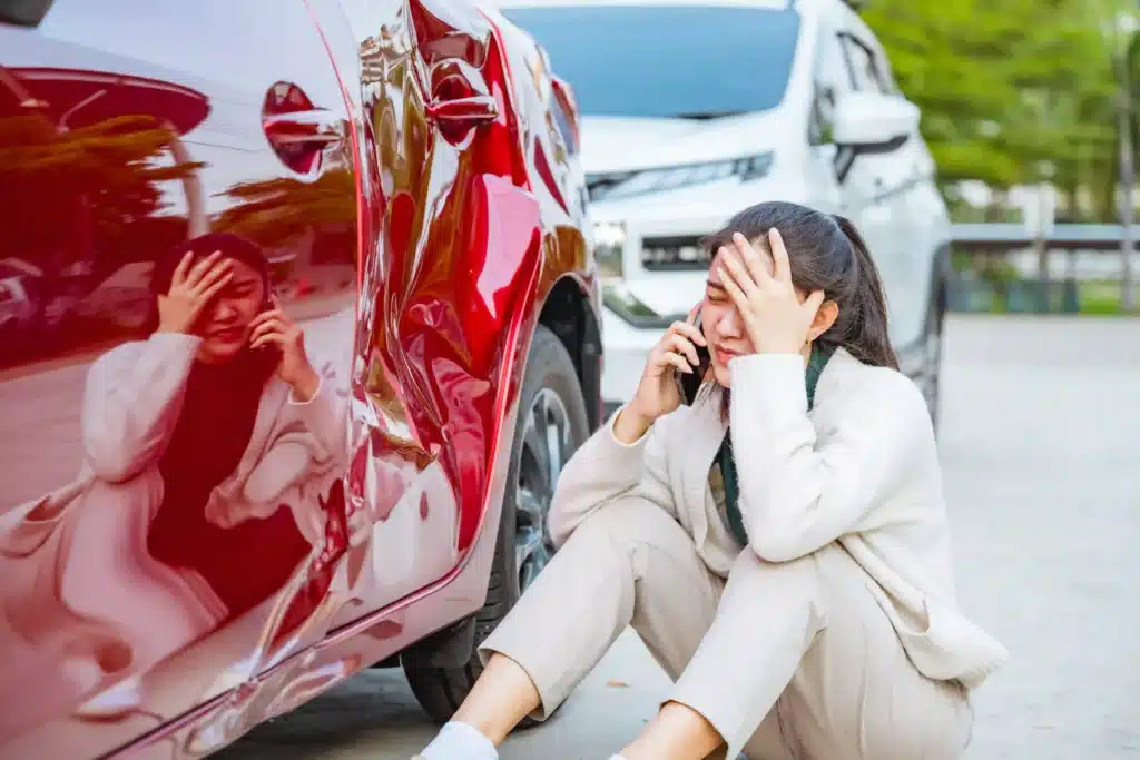 distraught-woman-calling-after-car-accident-roads