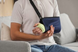 A man with a broken arm wondering, “How do I know if I have a personal injury case?”