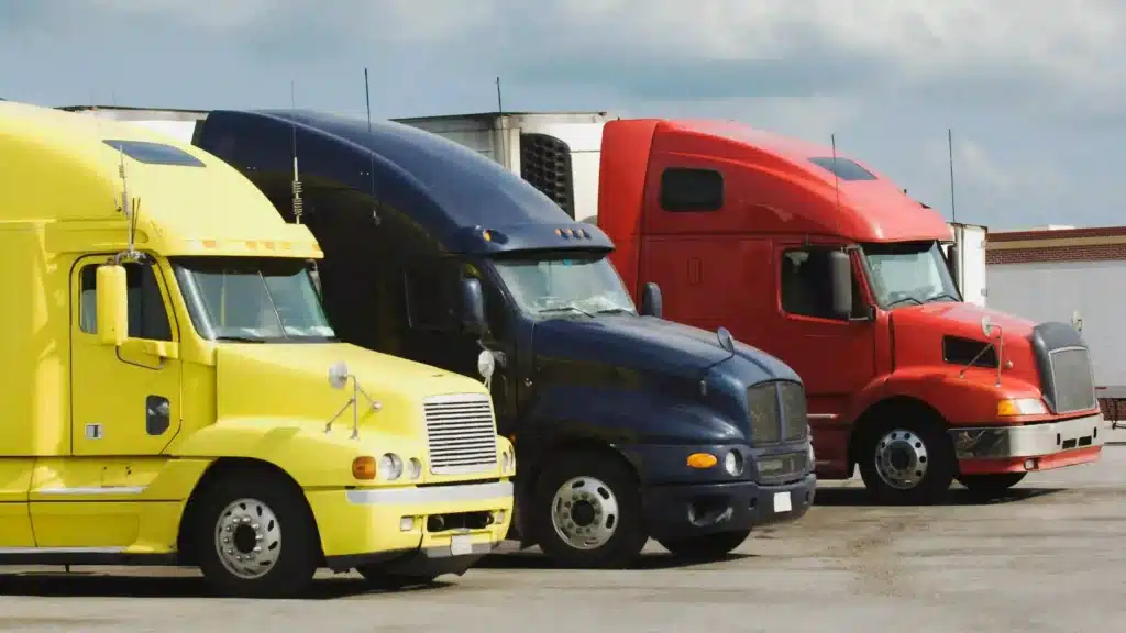 Colorful Semi Trucks Parked in a Row