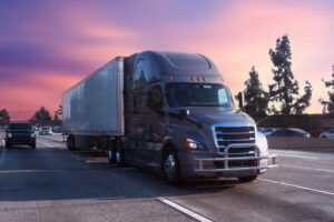 A truck driving on the highway. Who is liable in a truck rollover accident in Louisiana?