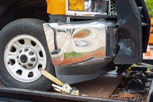 A dented front-end of a truck after a rear-end accident in Louisiana. How much compensation can I get?