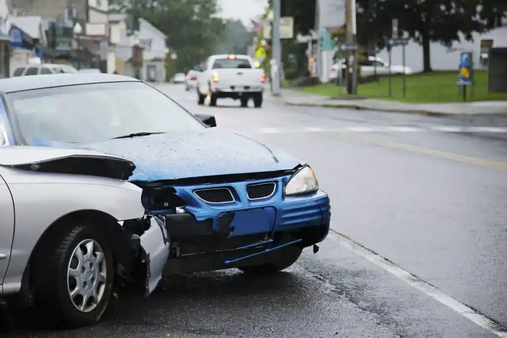 Car Accident on City Street During Rainy Weather