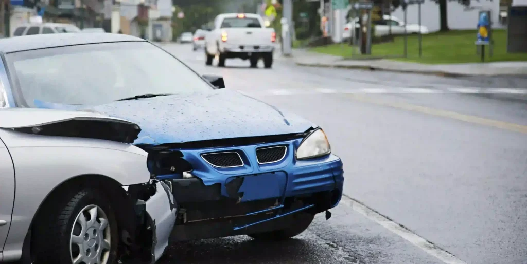 Car Accident on City Street During Rainy Weather