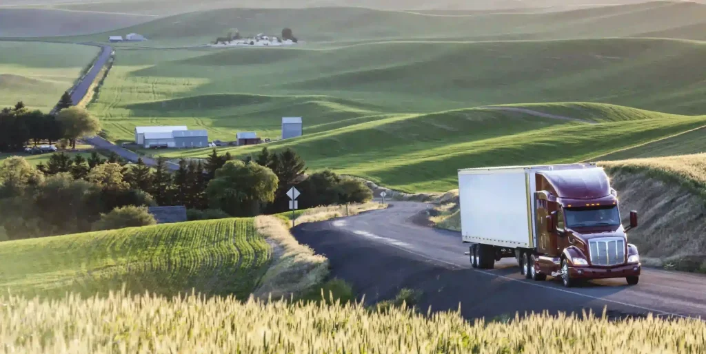 commercial-truck-driving-though-wheat-fields-of-ea