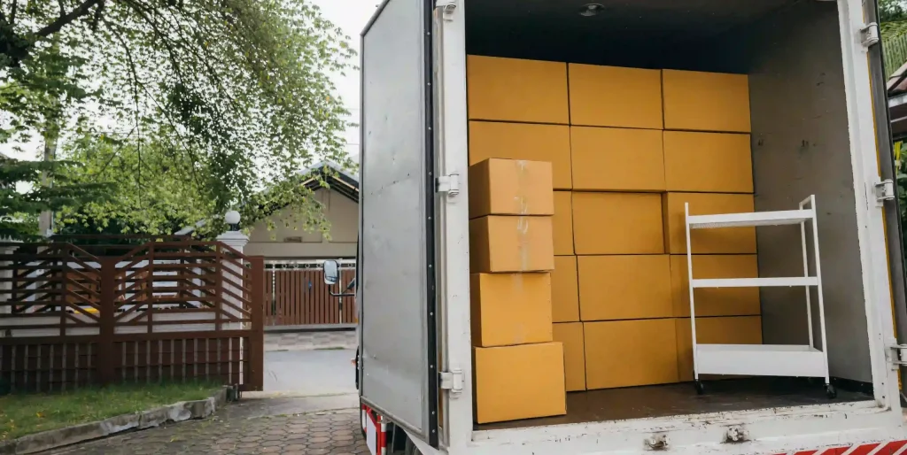 U-haul moving-truck-full-of-boxes-in-residential-area-