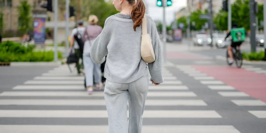 pretty-girl-crossing-street-